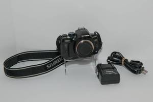 lot 2 image: Olympus E-620 Camera and Battery