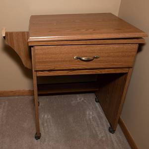 lot 74 image: Sewing Table with an Extendable Leaf