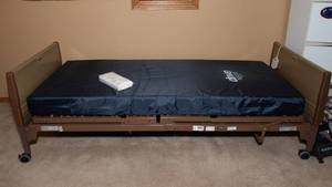 lot 67 image: Invacare Fully Electric Hospital Bed