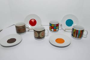 lot 131 image: Caribou Coffee Stacking Cups and Saucers