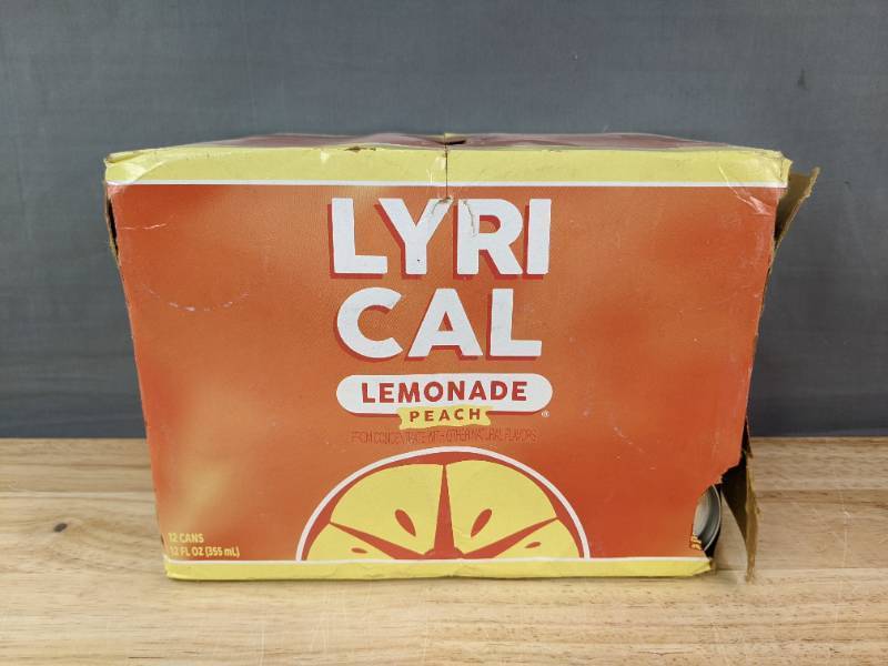 lot 25J image: Hard to Find Brand New Case of 12 Lyrical Peach Lemonade 12oz Cans Rare N