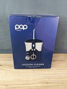 lot 63D image: Brand New Pop Sonic Lagoon Water Flosser N
