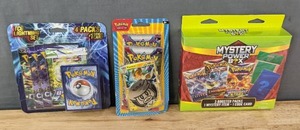 lot 24 image: Brand New Pokmon TCG Lighting Set, Pokmon TCG Scarlet & Violet Pawmot Blister Pack and Pokmon Mystery Power Box I