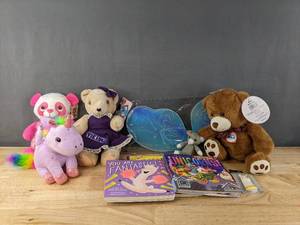 lot 245 image: New FairyButterfly Costume Wings, Assorted Plush Animals, and Board Books B