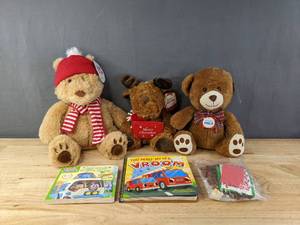 lot 227 image: Brand New Christmas Stuffies, Kids Books and Kids Gingerbread House Craft B