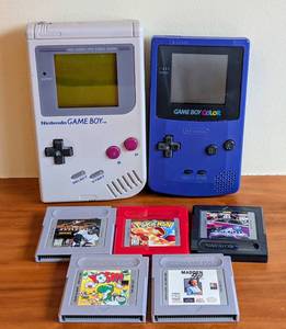 lot 28 image: Pair of Nintendo Game Boys and Games