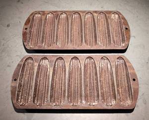 lot 68 image: Pair of Vintage Lodge Cast Iron Cornbread Pans