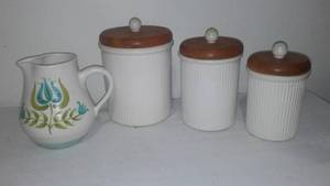 lot 320 image: Mid-Century Modern Pitcher 3 Pc. Oakdale Canister Set.