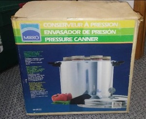 lot 323 image: Mirro Pressure Canner With Jars.