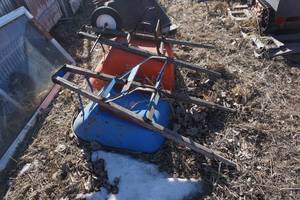 lot 30 image: Blue Wheel Barrel