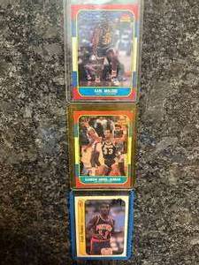 LOT of (3) Karl Malone 1986 Fleer Rookie, Kareem, & Isiah Thomas sticker.