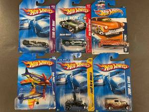 L - Set of 7 Hot Wheels Die-Cast Cars and Airplane Collection