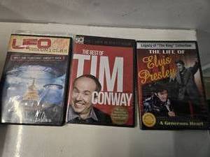 lot 94 image: Lot of 3 DVDs UFO Chronicles, 2. 50 Best of Time Conway and 3. The life of Elvis Presley ( All New)