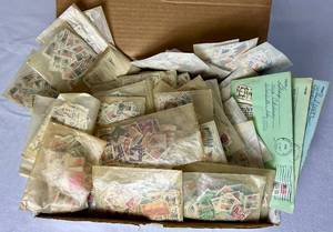lot 58 image: Mystery Box of United States Loose Stamps from Different Years