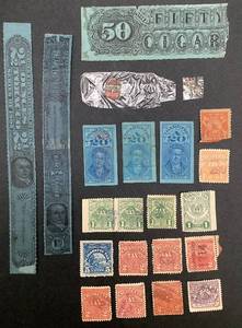lot 197 image: United States Cigarette and Tobacco Tax Revenue Stamps from Iowa, Louisana, Ohio, Kansas and Alabama