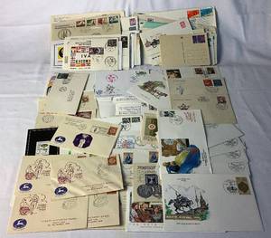 lot 267 image: Collection of International First Day Covers, Postcards, Commemorative Envelopes, Commerative Stamps and more
