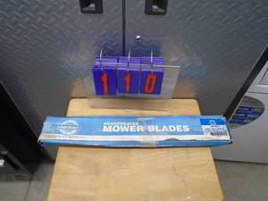 lot 110 image: Qty of 2 Cub Cadet 759-3817 mower blades. As shown.