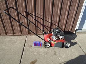 lot 116 image: MTD gas push mower. Good used condition. Tested & works. As shown.