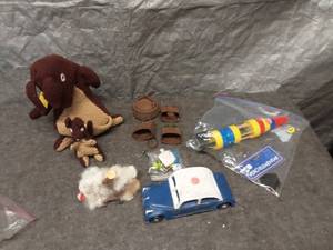 lot 45 image: Vintage Toy Collection Stuffed Kangaroo, Fur Toy, Rocket, and More