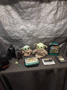lot 58 image: Star Wars Merchandise Collection Featuring Darth Vader, Mandalorian Figures, and Grogu Gear
