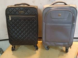 lot 82 image: Set of 2 Rolling Carry-On Suitcases - Black and Grey