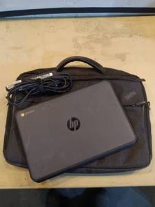 lot 118 image: HP Chromebook with ThinkPad Case and Charger