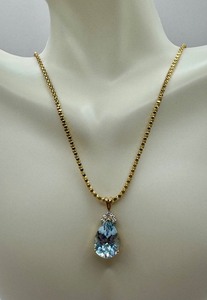 lot 6J image: Gorgeous 14k Gold Diamond and Topaz Pendant