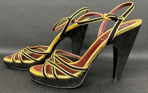lot 31 image: Prada Black Suede and Gold Platform Heeled Sandals - Made in Italy