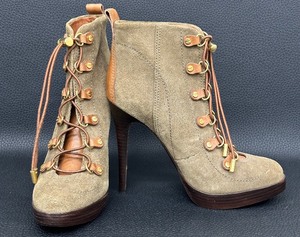 lot 41 image: Tory Burch Halima Olive  Burnt Lace-Up Suede and Leather Boots
