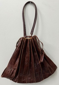lot 40 image: Beautiful Brown Embossed Leather Draw-String Purse - By Leader in Leather