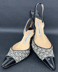 lot 81 image: Manolo Blahnik Ratan and Black Patent Leather Slingback Heels - Size 38 12