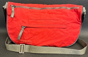 lot 10 image: Vintage Prada Linea Rossa Red Nylon Double Zip and Buckle Saddle Crossbody Bag