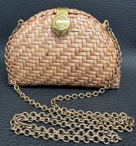 lot 84 image: Woven Rattan with Gold Accents Small Purse by Vanessa