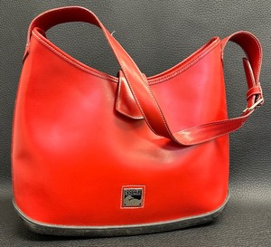lot 67 image: Vintage Dooney & Bourke Red Shoulder ParaSole Bag with Shoulder Strap