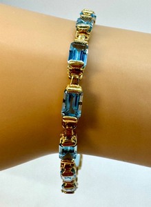 lot 98J image: 14K Yellow Gold and Topaz Tennis Bracelet
