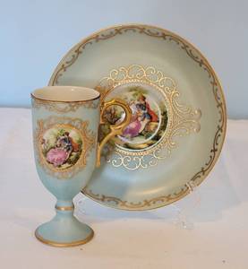 lot 60 image: Handpainted French Pedestal Porcelain Cup and Saucer