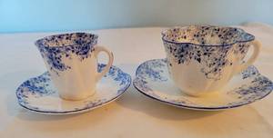 lot 62 image: Shelley DAINTY BLUE Demitasse and Tea Cup & Saucer Pair