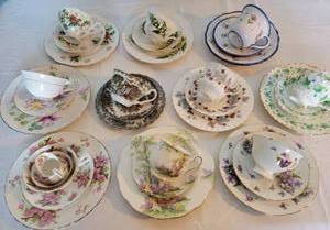 lot 74 image: Graceful Porcelain Cup & Saucer Trio Collection