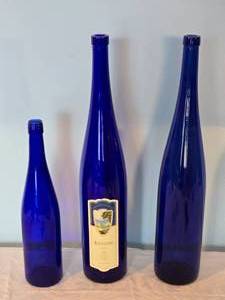 lot 22X image: Vintage Cobalt Glass Collection - Tall Wine Bottles - (3)