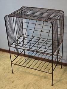 lot 110 image: Stylish Black Twisted Metal Magazine Rack Console