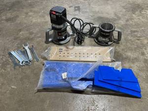 lot 51 image: PORTER CABLE 7519 Router (Working)  Rockler Jig It Template System  Rockler Country Panel Templates in Good Condition