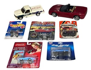 lot 159 image: AMT Ertl 125 Scale Brickyard 400 Chevy C-1500 Pickup Model  118 Scale Chevy Corvette Diecast  New Sealed Diecast Cars