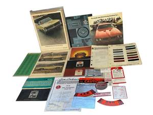 lot 166 image: Vintage Pontiac GTO Owners Manuals, 1966 Ford Thunderbird Decal Kit and More