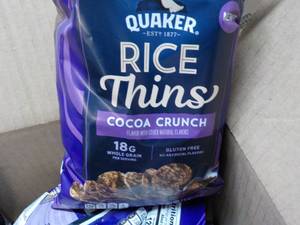 lot 82 image: 12 ct 2.5 oz bags Quaker Rice Thins...
