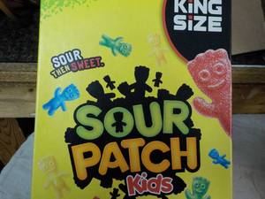 lot 163 image: 18 ct 3.4 oz bags Sour Patch Kids...
