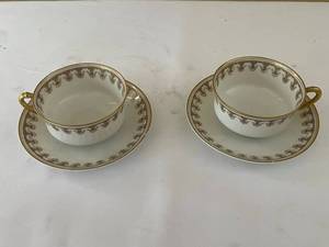 lot 64 image: Haviland Limoges Teacup & Saucer Pair