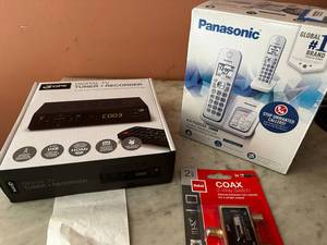 lot 131 image: Panasonic Phone & GPX TV Tuner Set