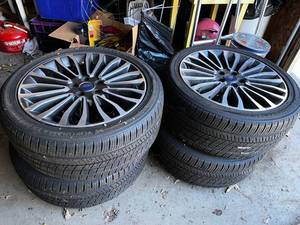 lot 408 image: Ford Rims with Yokohama Tires 18 Set