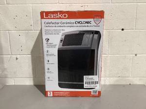 lot 524 image: Lasko 1500W Cyclonic Ceramic Console Electric Space Heater with Timer