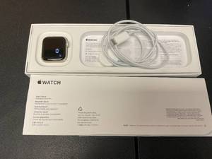 lot 56 image: Apple Watch SE (2nd Gen) GPS 40mm Smartwatch with Starlight Aluminum Case